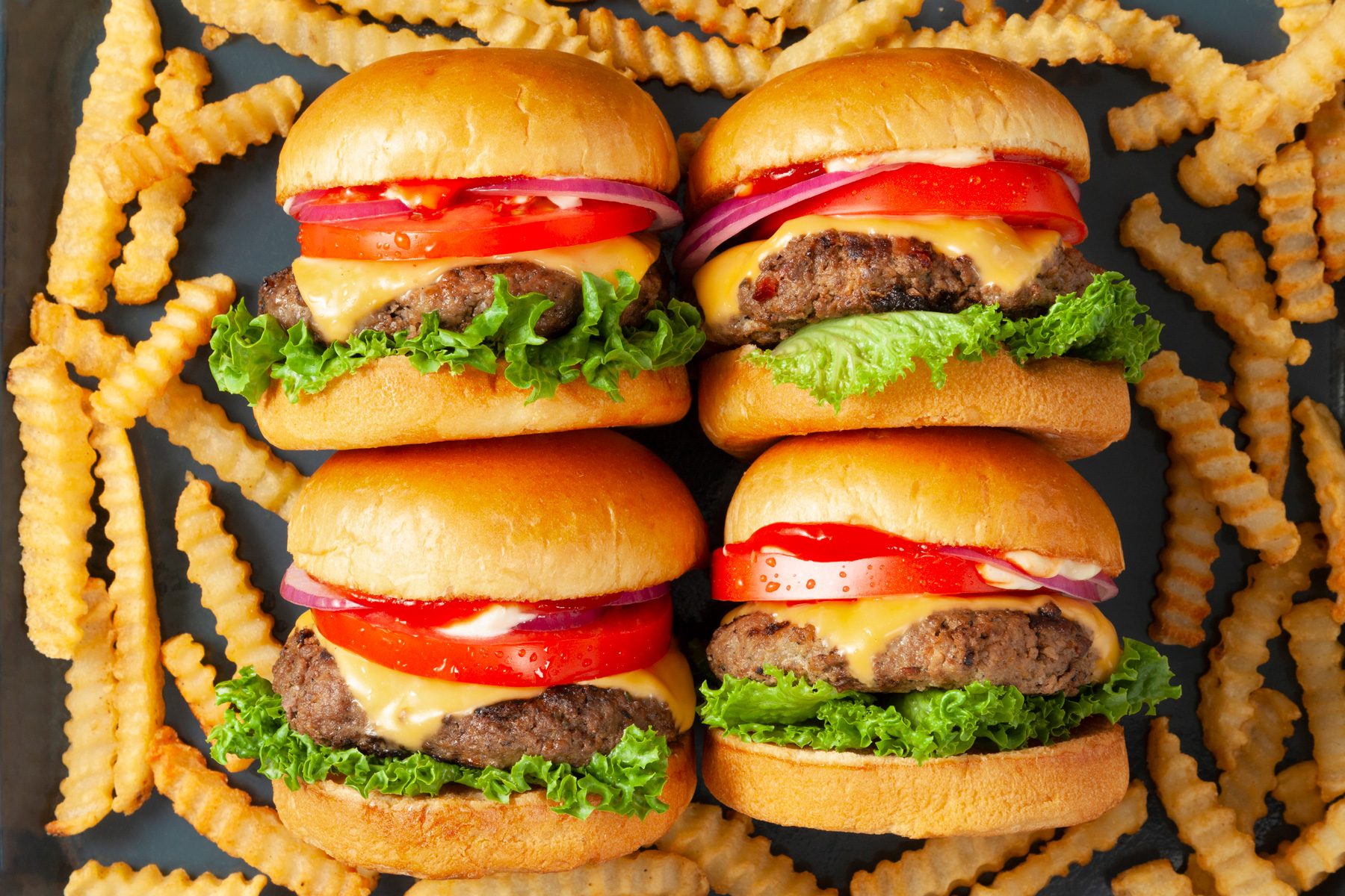 wide shot of ranch burgers with fries