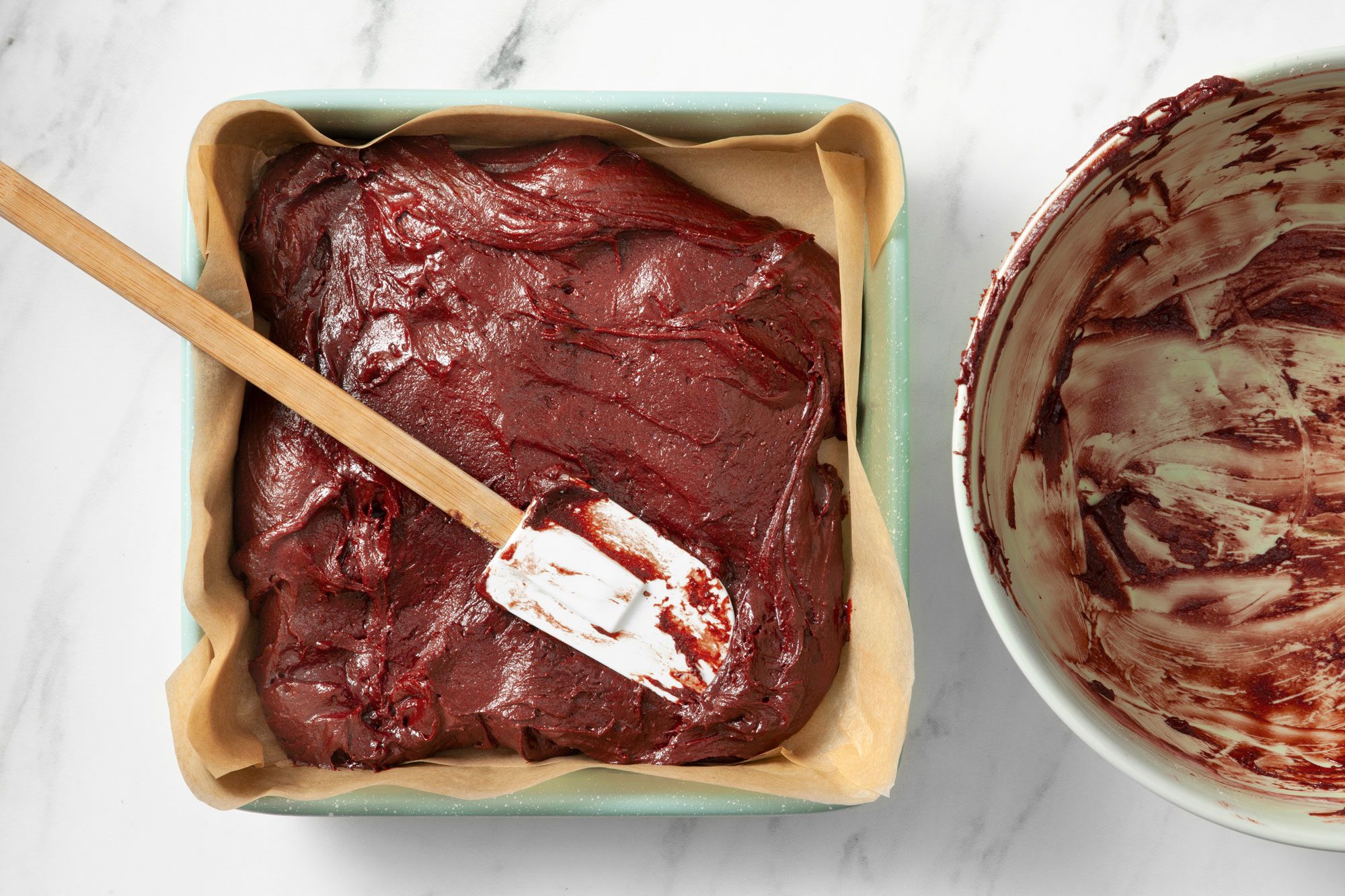 Transfer batter to a parchment paper lined square baking pan