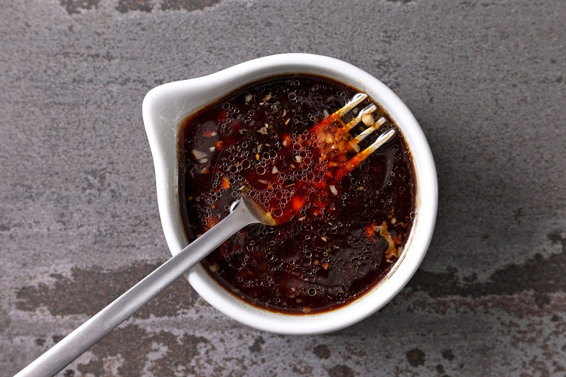 In a small bowl, whisk soy sauce, oyster sauce, garlic, ginger and wine.