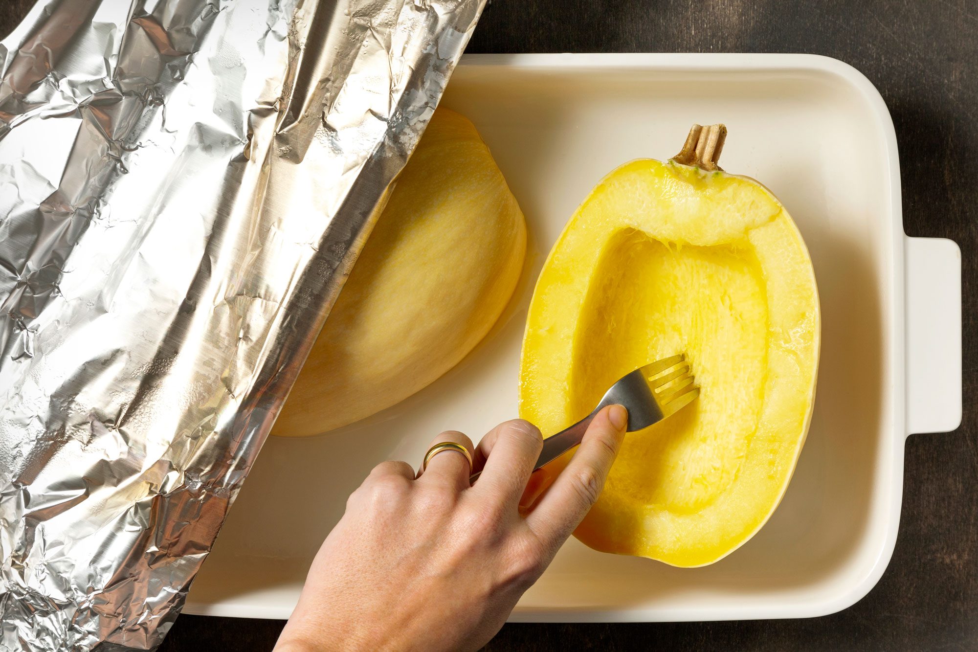 Cover; bake until the squash is easily pierced with a fork