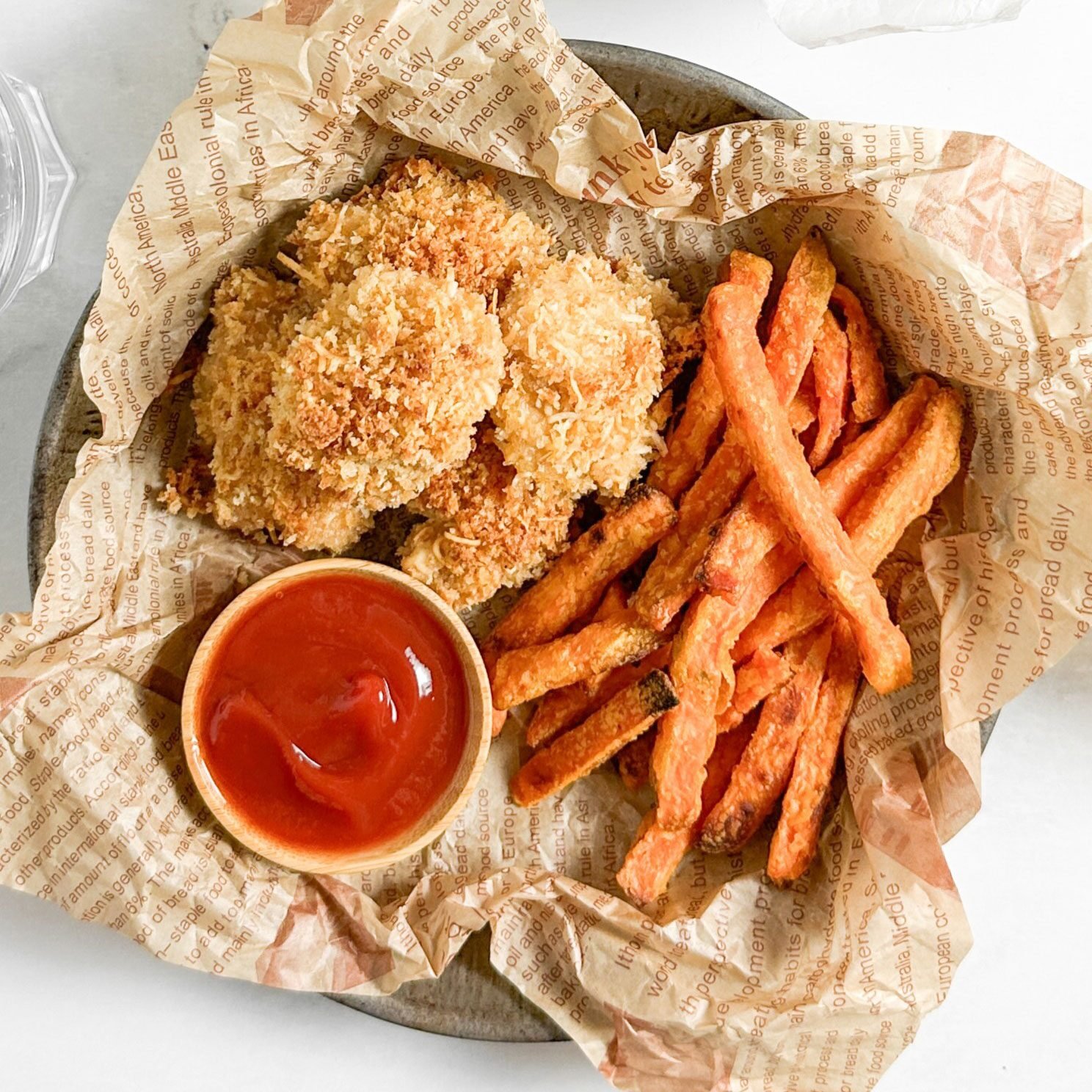 Taste of Home Spicy Chicken Nuggets with ketchup and sweet potato fries