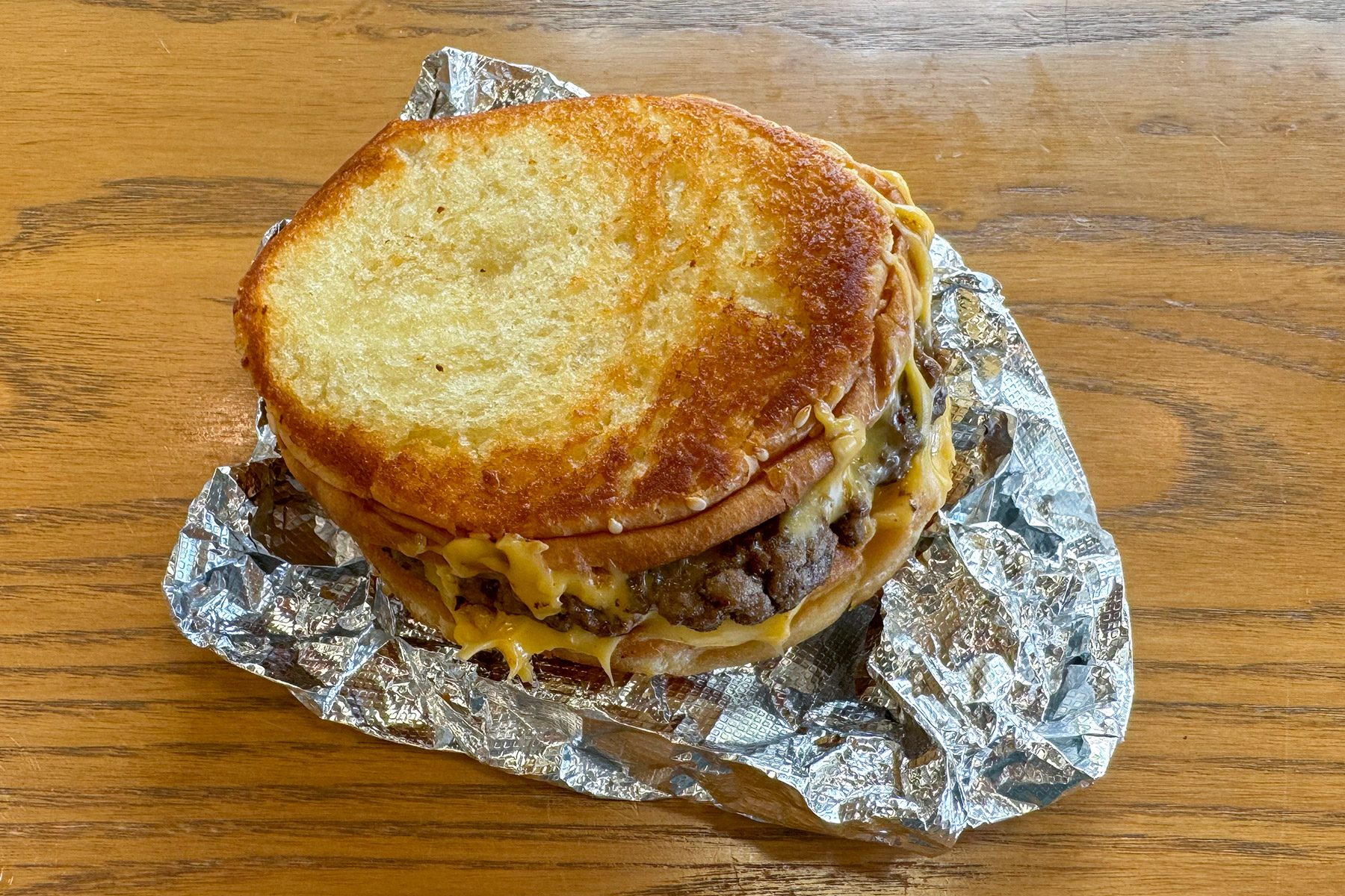 Patty Melt on wooden base