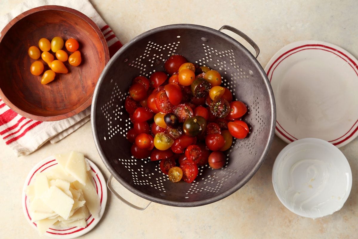 Making Taste of Home's Tomato Galette served on a beige table made of wood.