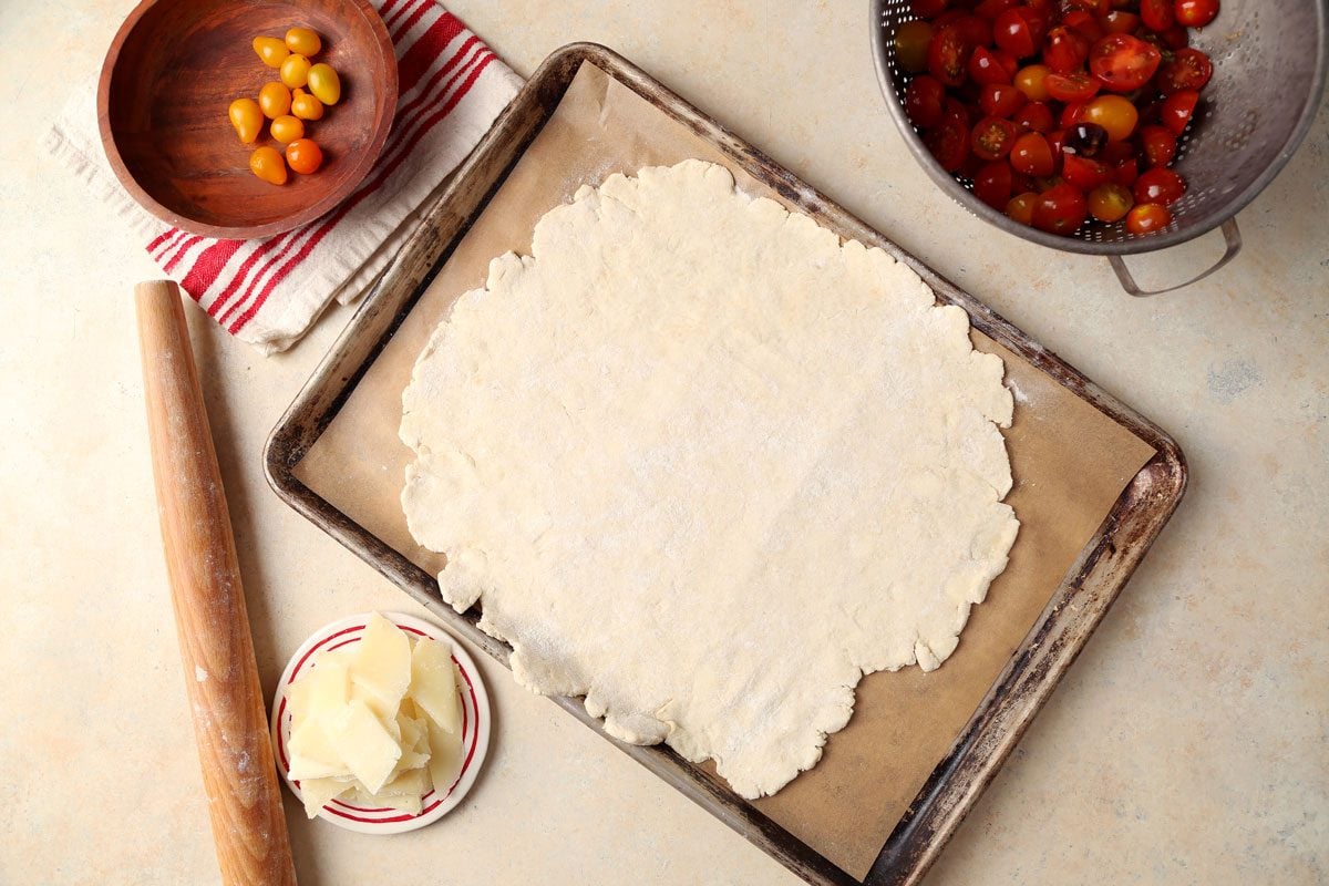 Making Taste of Home's Tomato Galette served on a white tablecloth.