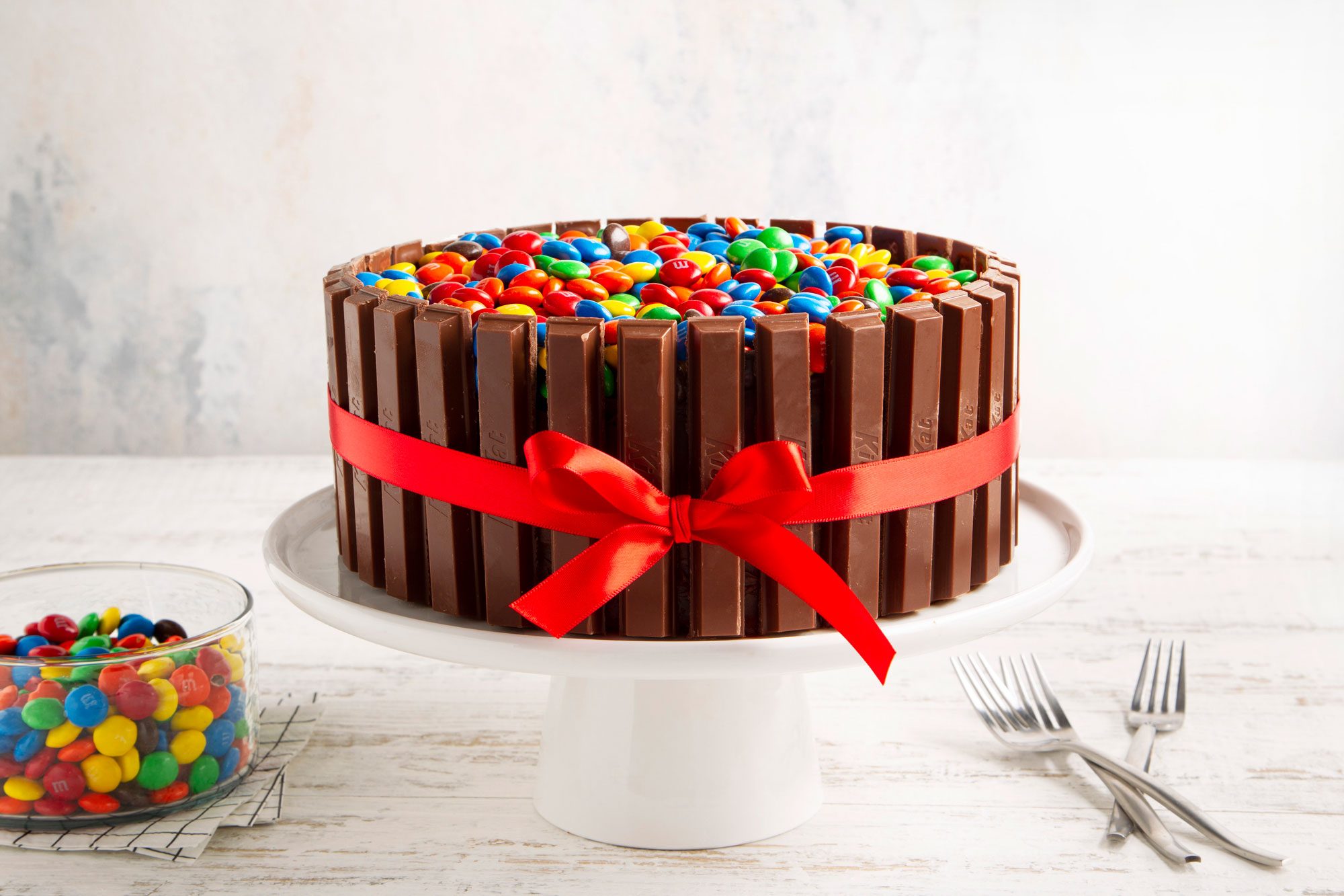 Kit Kat Cake on a cake stand; marble background;