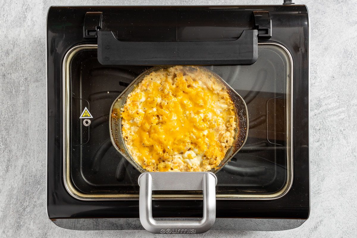 Taste Recipes Air Fryer Mac and Cheese photo of cooking the mac and cheese in the air fryer.