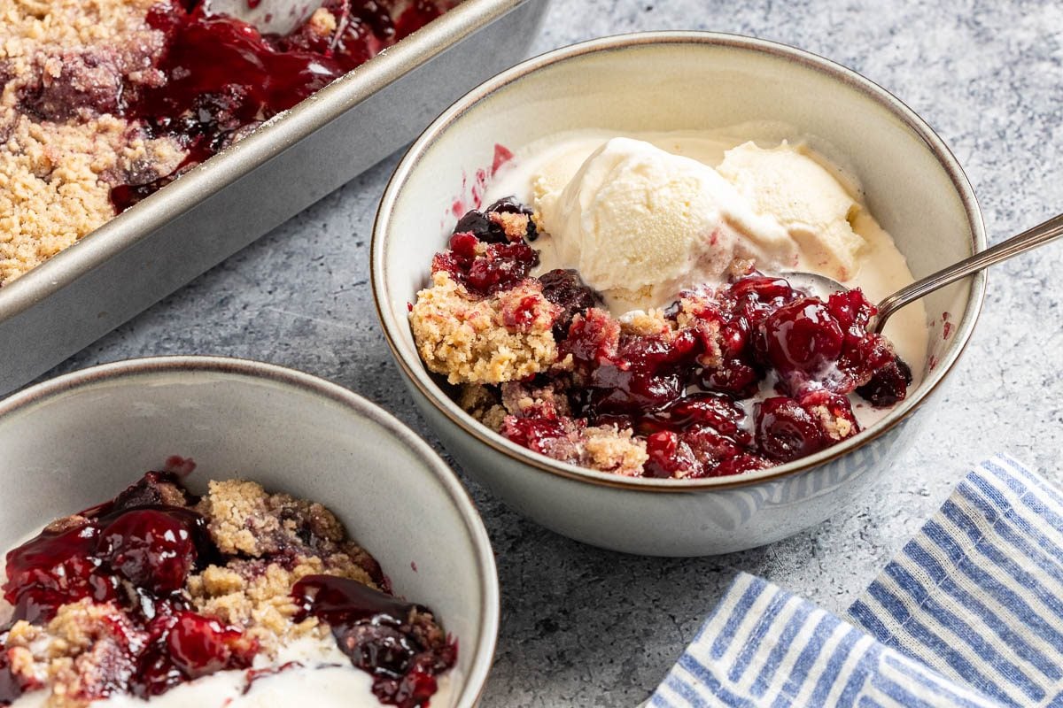 Taste of Home Cherry Crumble Recipe photo of the finished recipe served into bowls.