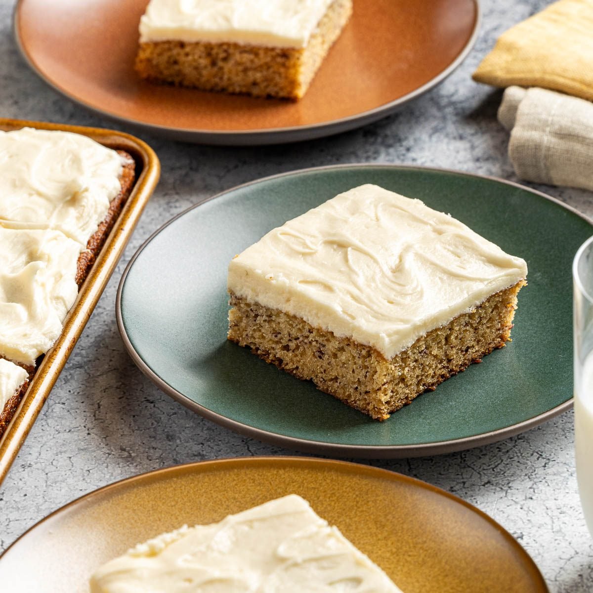 Taste of Home Banana Bars photo of the finished recipes cut into squares and placed on plates.