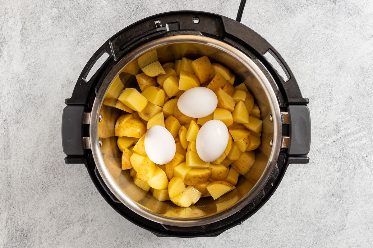 Taste of Home Instant Pot Potato Salad photo of pressure cooking the potatoes and eggs.