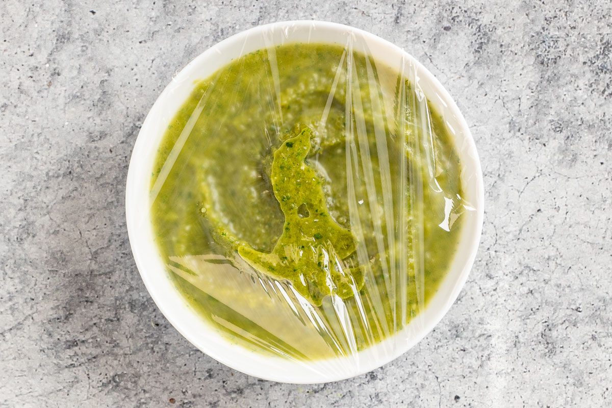 Jalapeno Salsa with cling wrap on the bowl