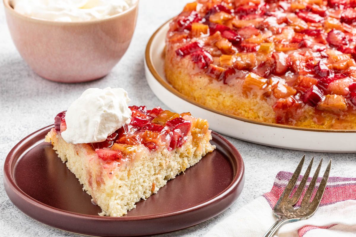 the finished Rhubarb Upside Down Cake cut into slices and served on plates.